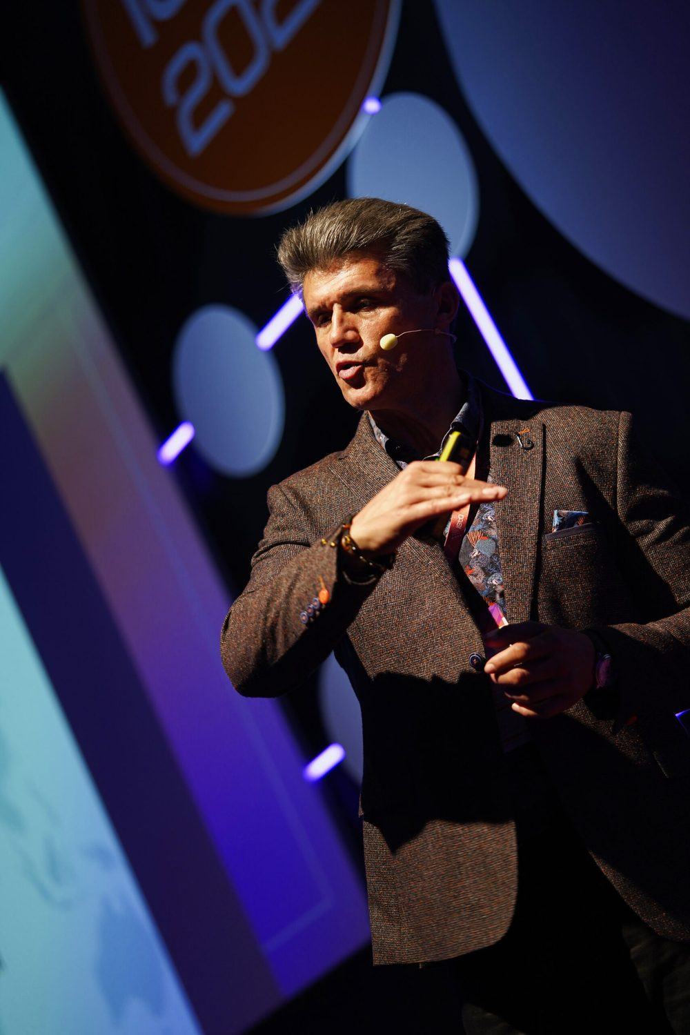 Peter Ivanov speaking on stage